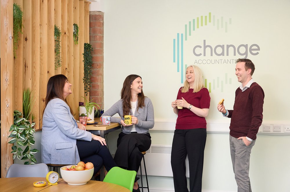 Change Accountants Four People Chatting